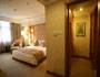 Guestroom of Grand Hotel Overseas Traders Club Hefei 