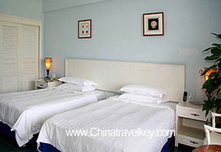 Guestroom of International Asia Pacific Convention Center HNA 

Sanya